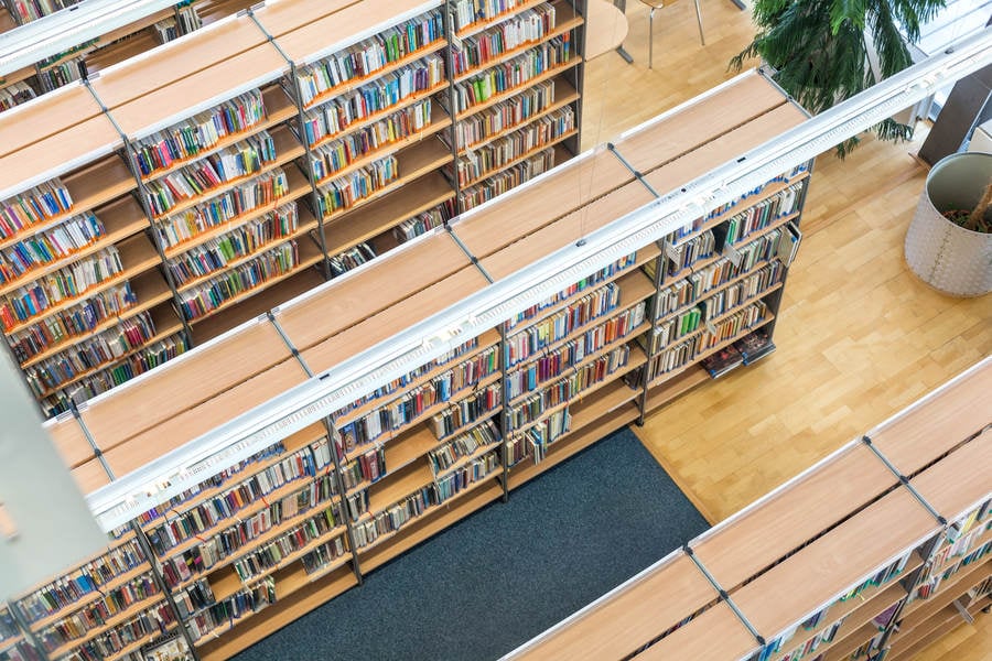 From-Above View of Books on Shelves in a Library