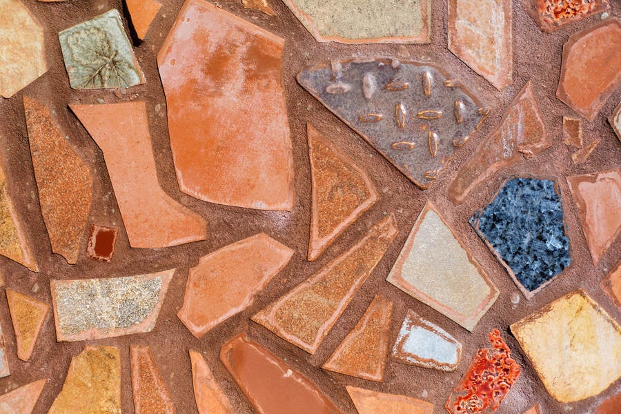 Detailed View of a Stucco Ceramic Mosaic with Diamond Pattern Metal Piece