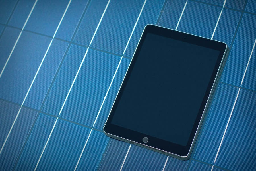 View of a Solar Panel with Digital Tablet