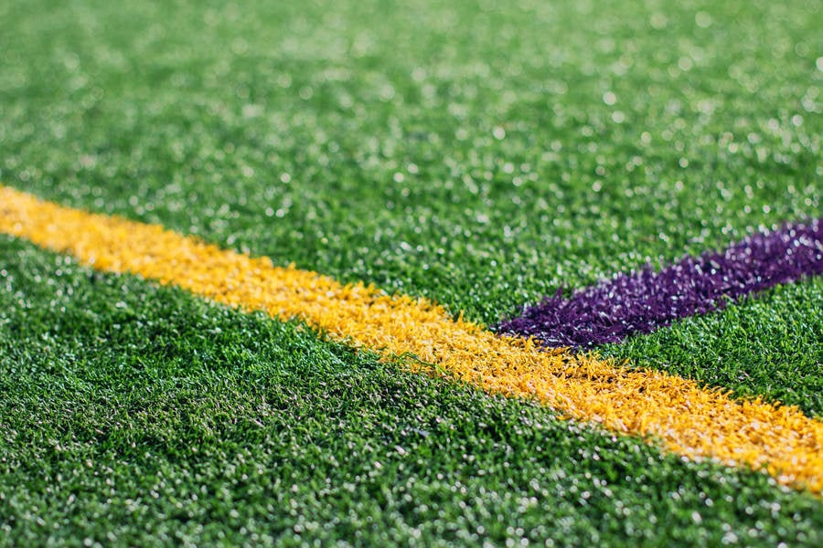 Close-Up View of Colorful Field Lanes on a Turf