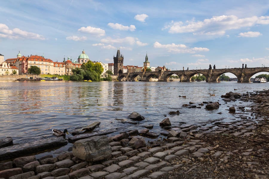 Low-Angle View of Vltava River with Charles Bridge in Prague