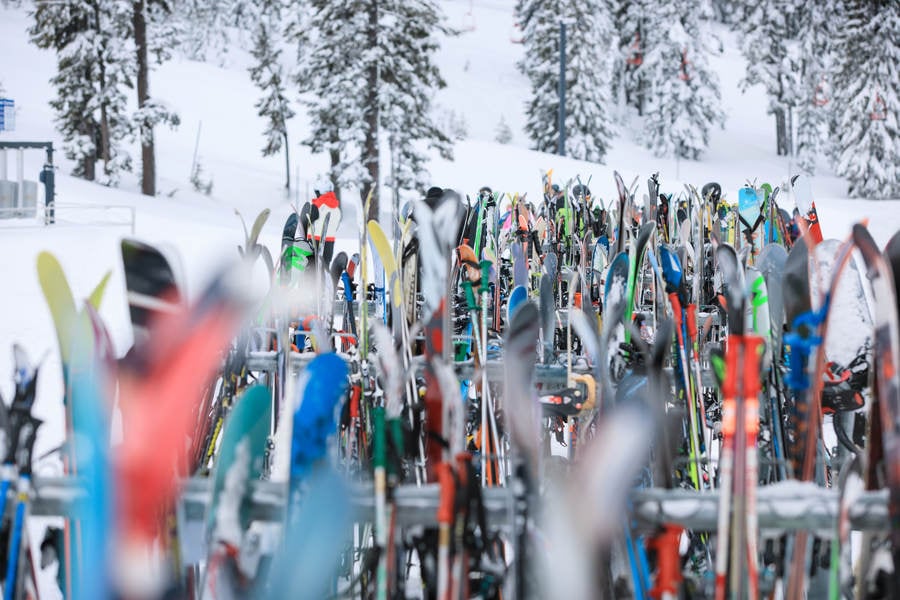 Perspective View of Skis and Snowboards on a Rack