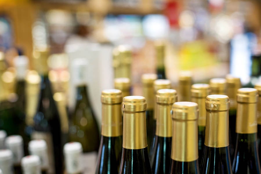 Close-Up of Nicely Arranged Wine Bottles in a Retail Store