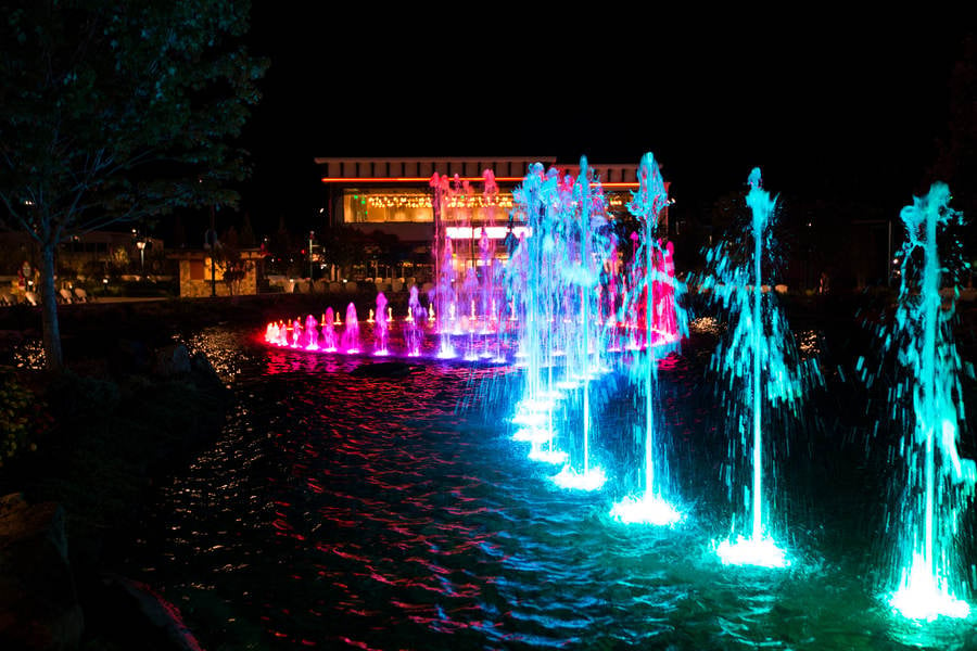 Night View of a Musical Fountain Featuring Rainbow Colors