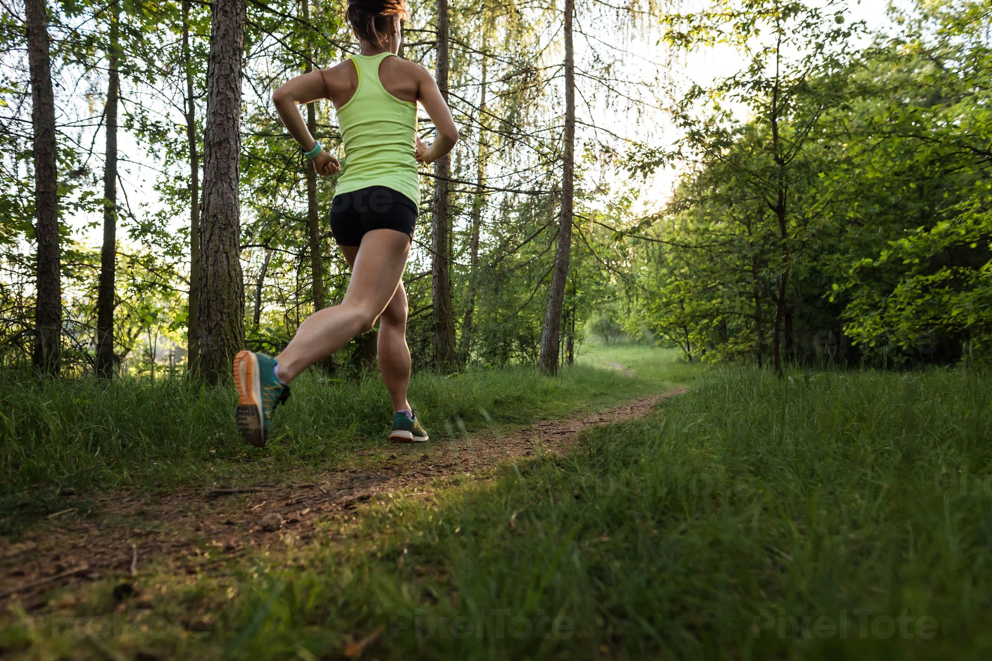 pv-lg-athletic-woman-running-on-a-forest