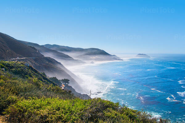 Scenic View of Pacific Coast with Morning Mist