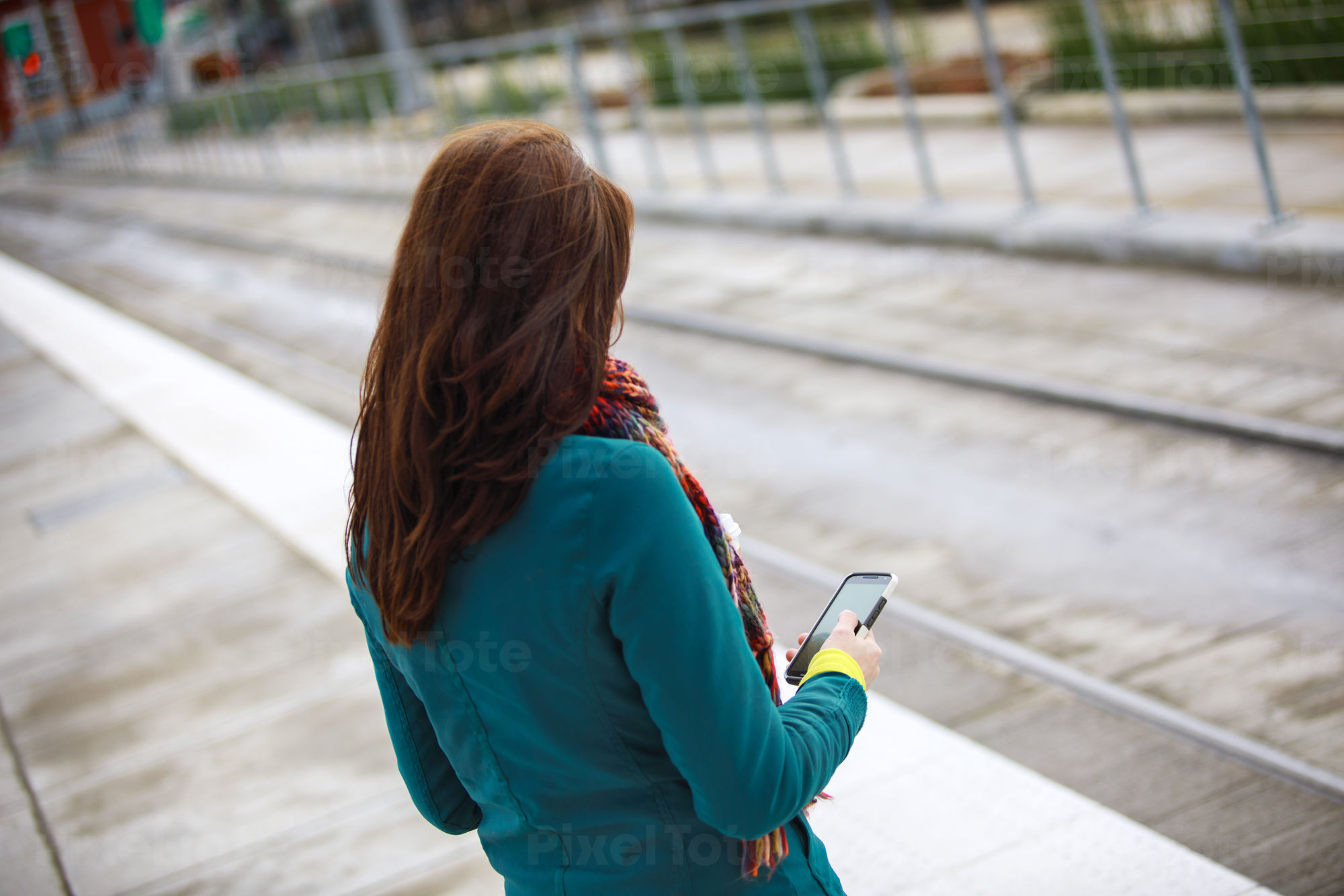 Woman Using a Cell Phone and Stock Photo - PixelTote
