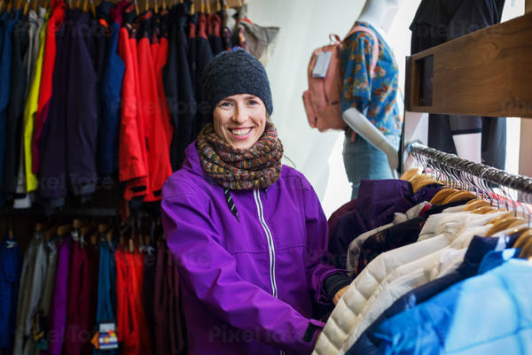 Woman Shopping for a Winter Outdoor Gear in a Clothing Store