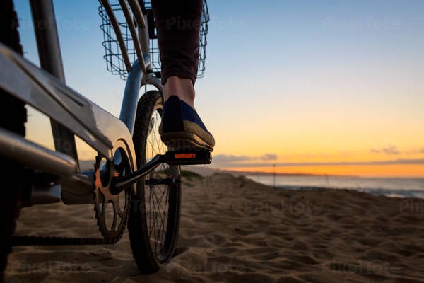 Close up of a Woman's Foot on a Bike Pedal During Sunset