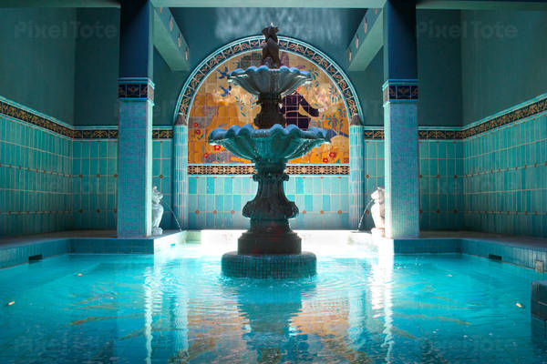 Interior View of a Turkish-Style Bathhouse with a Pool and Multiple Fountains