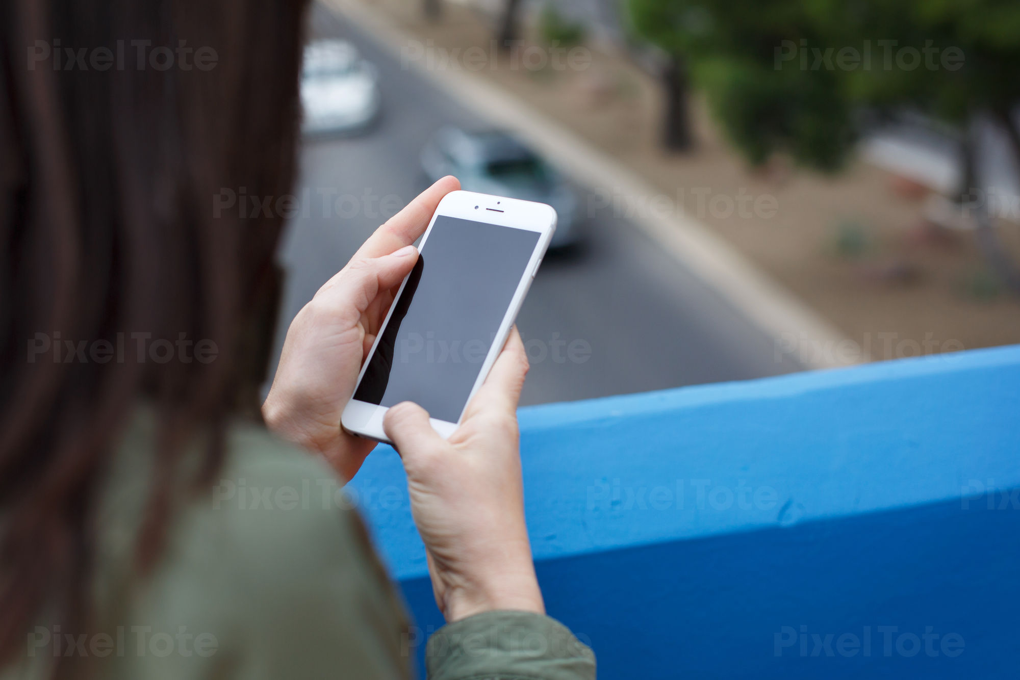 Woman Using a Cell Phone and Stock Photo - PixelTote