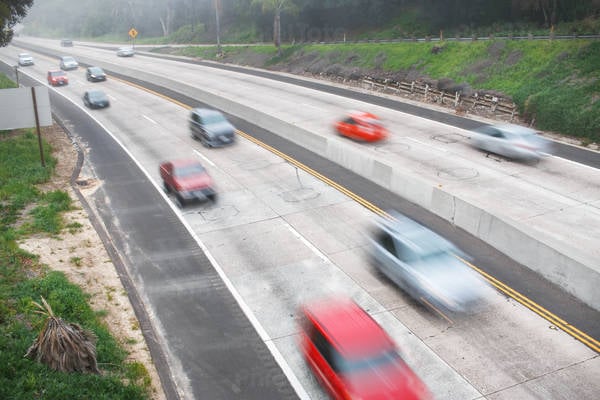 High-Angle View of a Highway with Motion Blurred Cars