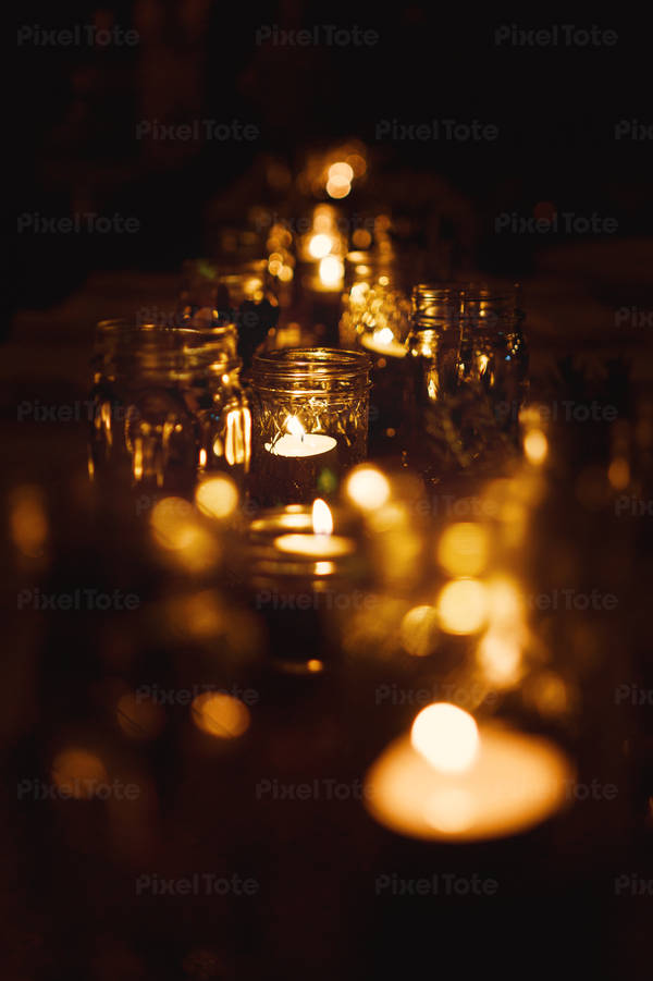 Close-Up View of Tea Candles on a Table