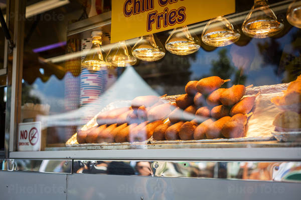 Corn Dogs Stacked in a Food Truck Window