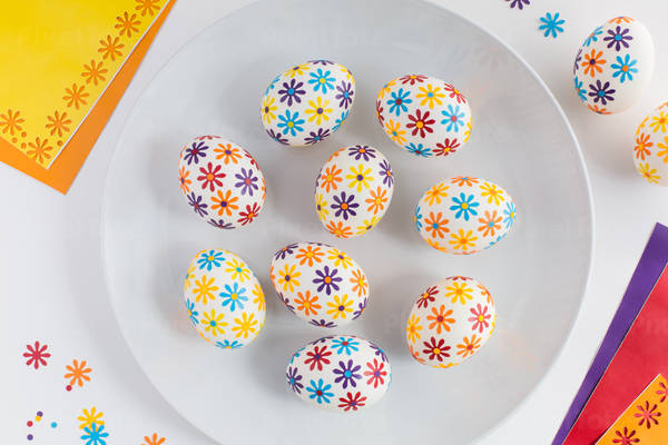 Easter Eggs Decorated with Flower Petal Stickers Arranged on a Plate