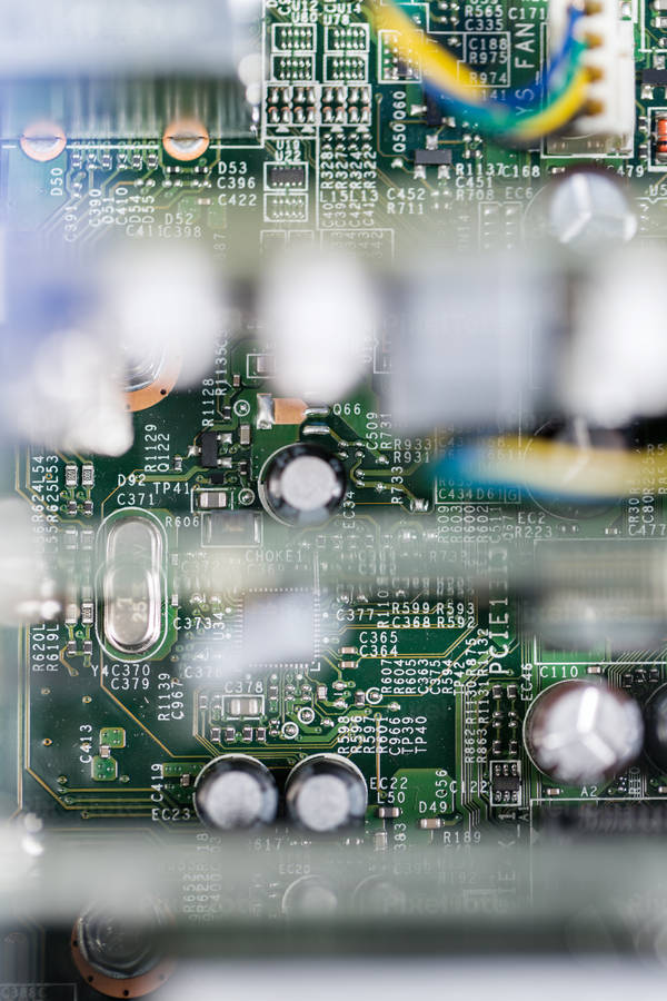 Close-Up View of a Circuit Board with Blurred Foreground