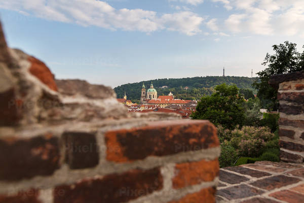 View from a Castle Wall of a Historic Town District with a Baroque Church
