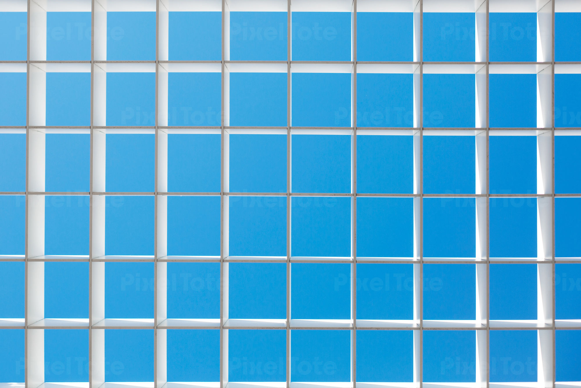 Full Frame Shot Of A Ceiling Grid Against The Blue Sky Stock Photo Pixeltote