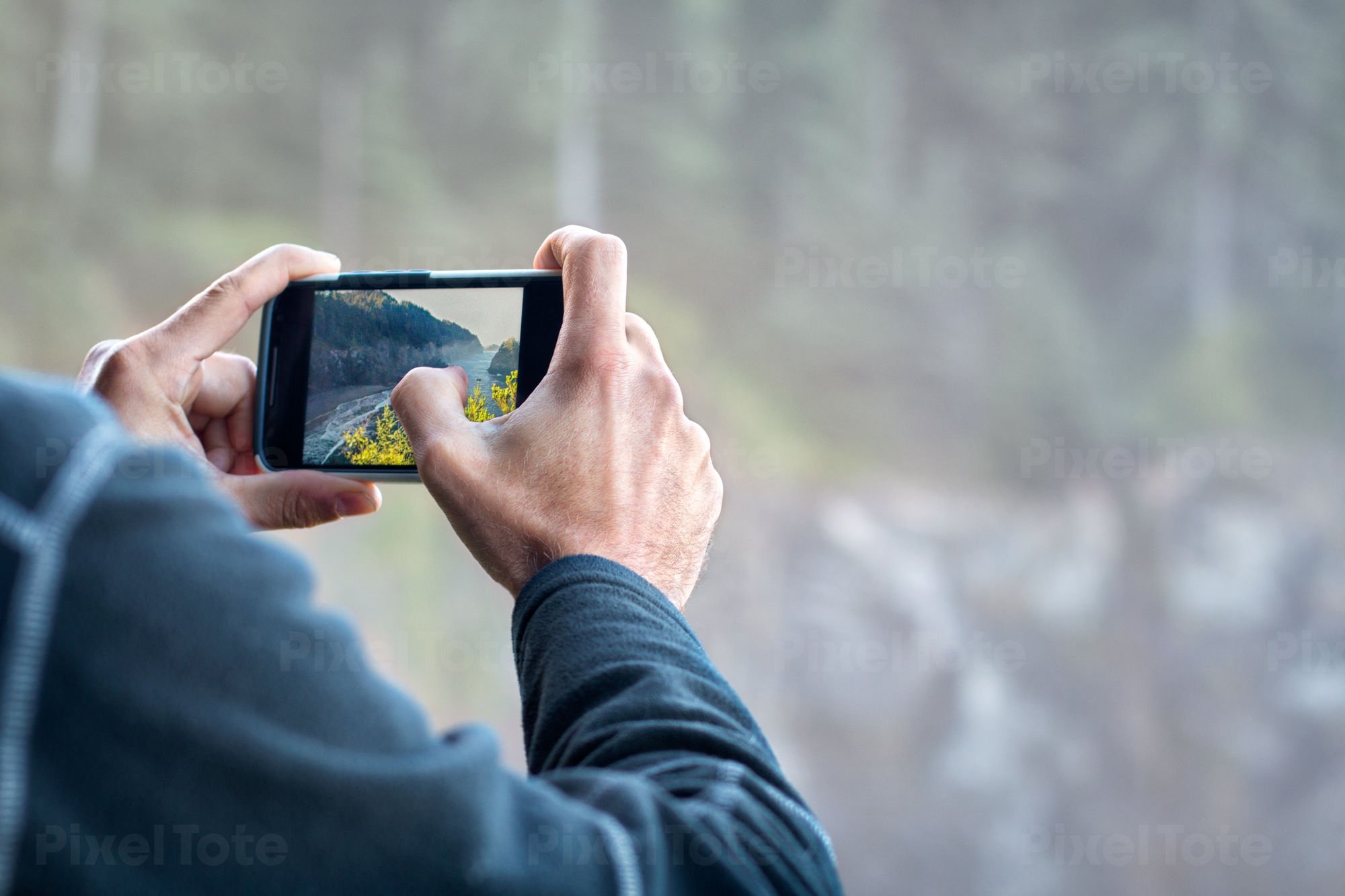 Man Taking  Picture with a Cell Phone  Stock Photo  PixelTote