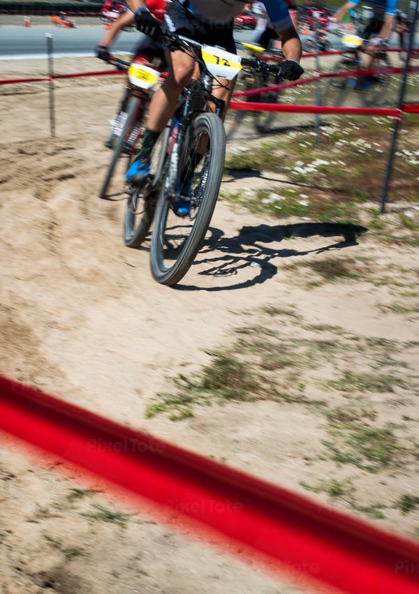 Blurred Motion of Mountain Bikers Competing in a Cross Country Race