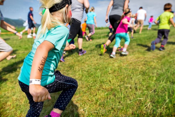 Little Girl Participating in a Kids Obstacle Course Race