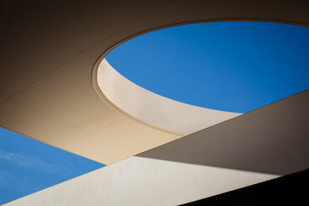 Low-Angle View of a Minimalistic Architecture Against Blue Sky