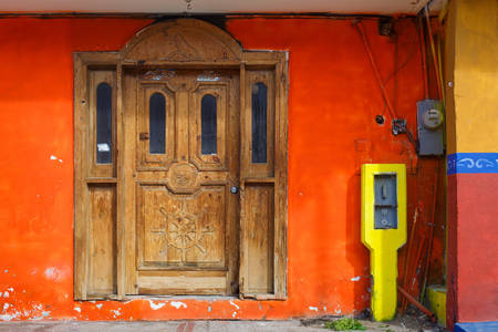 House with Colorful Facade and Wooden Door in Northern Mexico