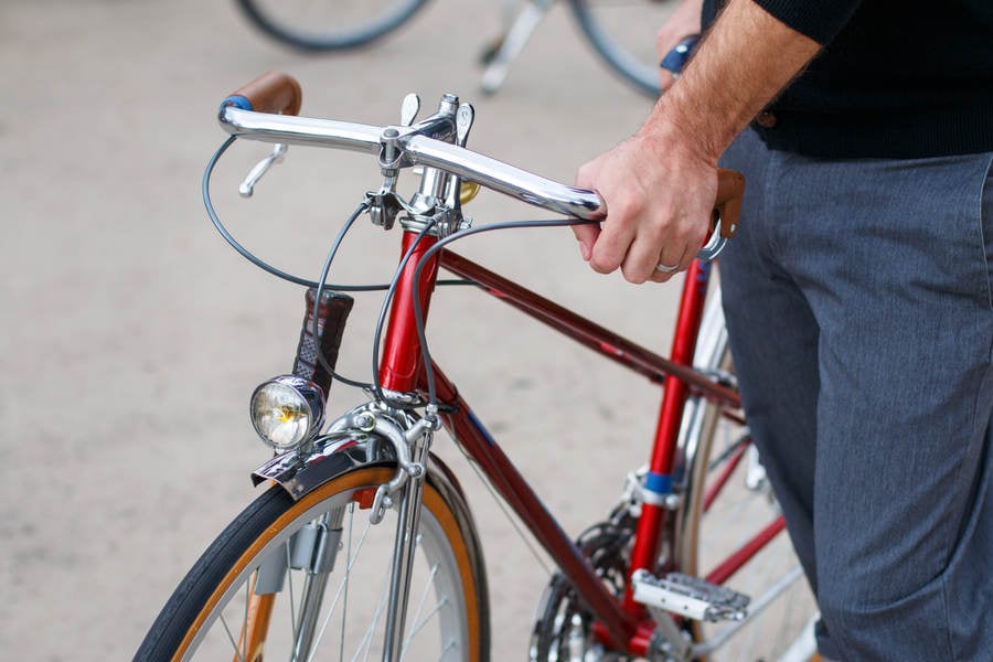 Man Holding Handle Bars of a Stock Photo PixelTote