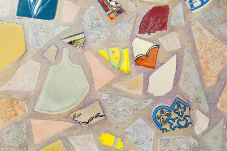 Detailed View of a Light Colored Clay Mosaic Featuring Pop-Color Pieces