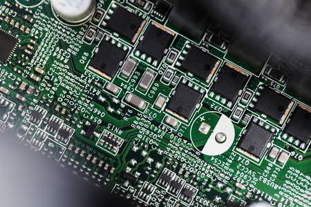 Close-Up View of a Printed Circuit Board with Multiple Integrated Circuits