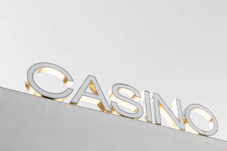 View of a Casino Sign Against a Clear Sky