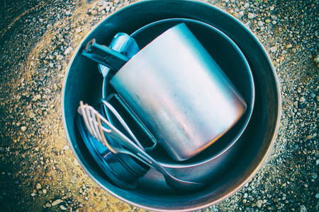 Table-Top View of Camping Cookware and Dinnerware