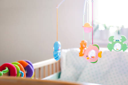 Mobile with Sea Life Toys Hanging Above Baby's Crib