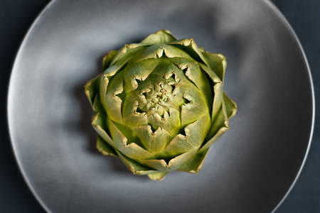 Directly Above Shot of a Steamed Artichoke on a Plate